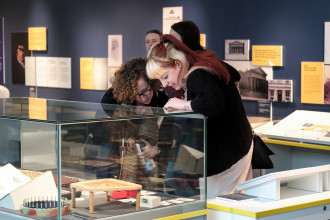 Two people looking at an exhibit at the Liverpool Museum